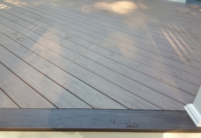Wolf PVC Decking- Weathered Ipe field with Black Walnut border